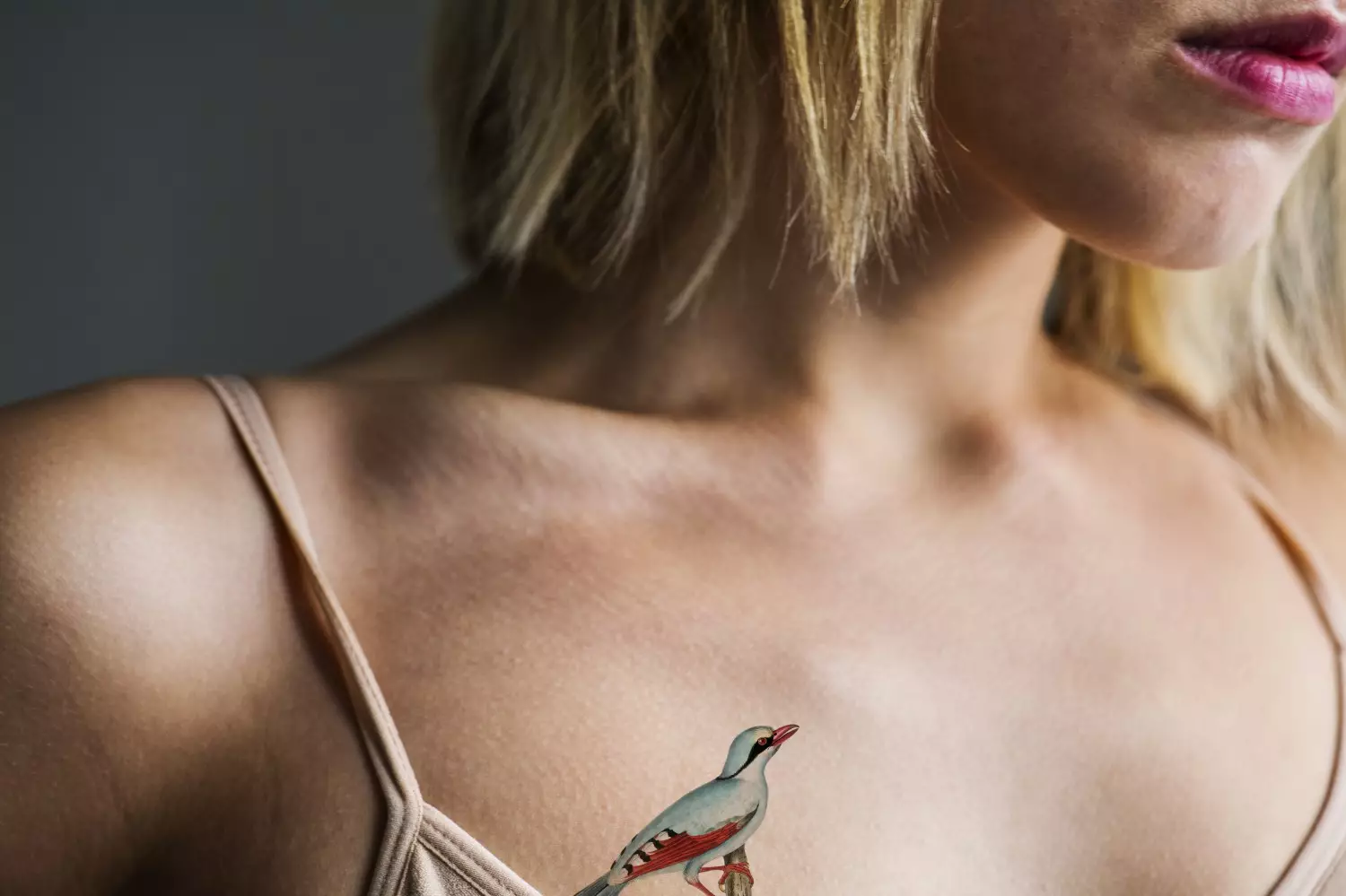 close up of tattoo on the chest of a woman pubdgn compressed