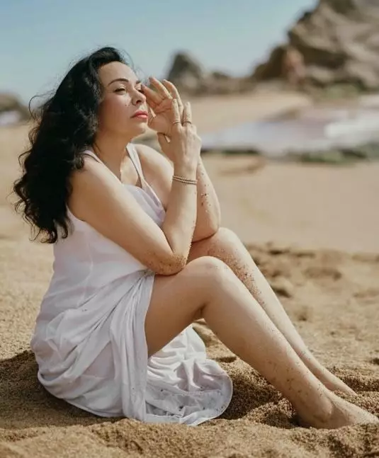 Rina, 60